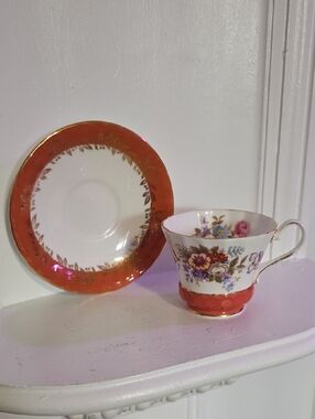 vintage Aynsley bone china tea cup and saucer set featuring a floral bouquet